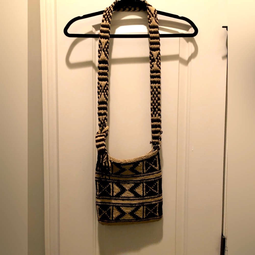 Lightly used specialty shop purchase, over the shoulder.. hands free bag